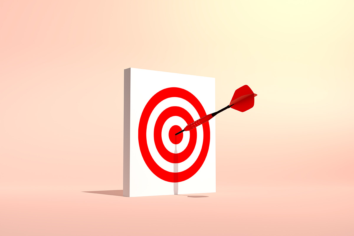 A red arrow in the centre of a target