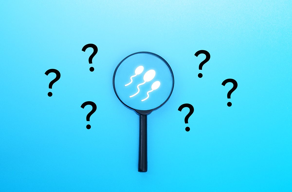 An illustration of sperm cells under an magnifying glass, surrounded by question marks, on a blue background