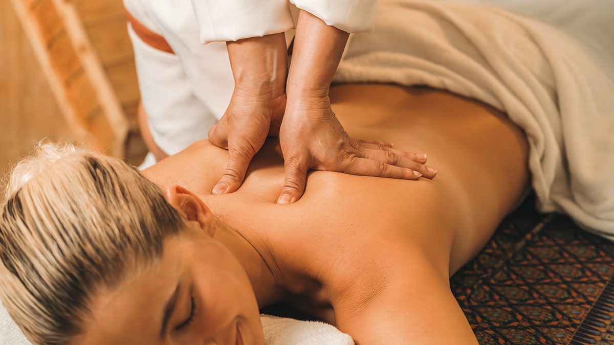 A woman having a back massage