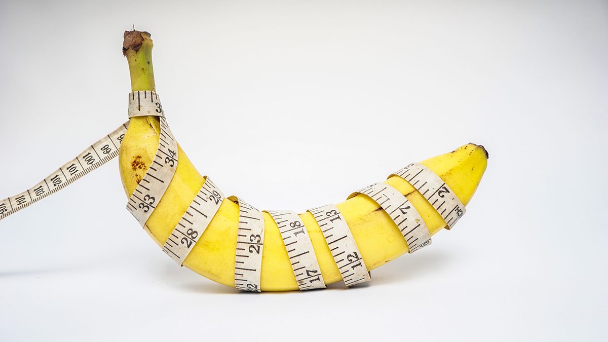 A measuring tape wrapped around a banana