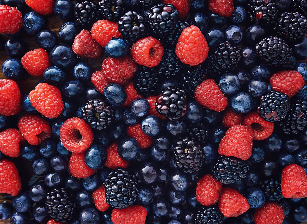 A pile of blueberries, raspberries and blackberries