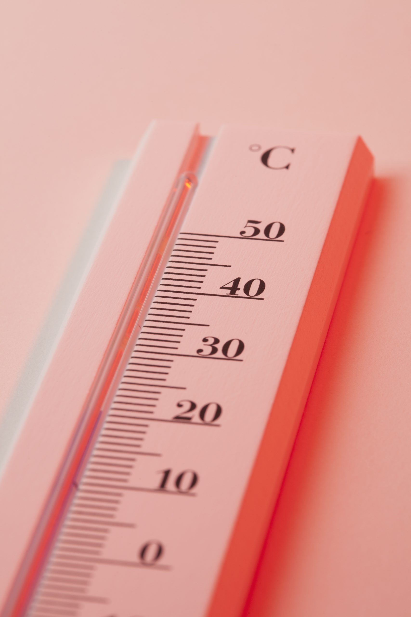 A thermometer measuring heat in Celsius
