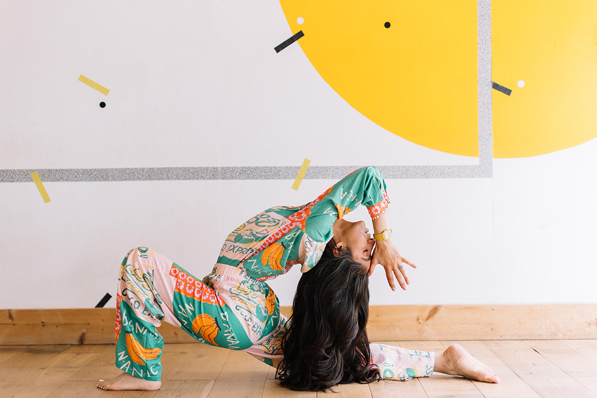 Ella Riggs performing a yoga pose