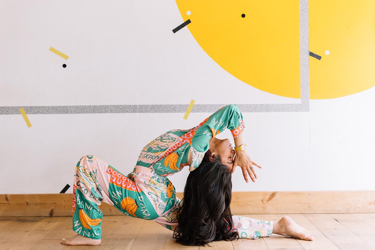 Ella Riggs performing a yoga pose