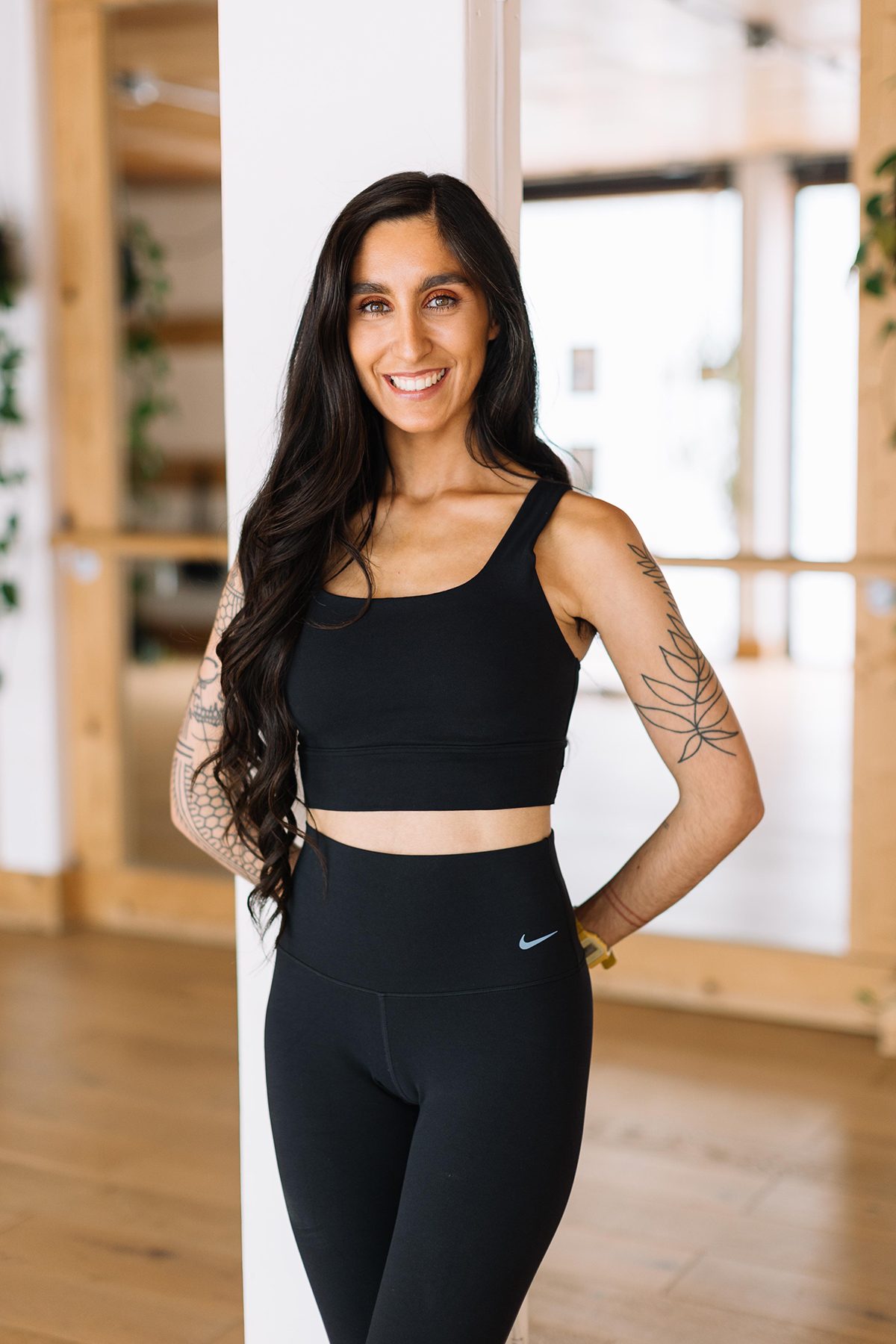 A headshot of Ella Riggs, owner of Elevate Studio