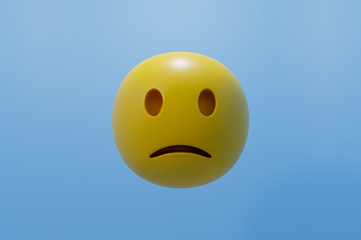 A round, yellow frowning face emoji is set against a blue background.