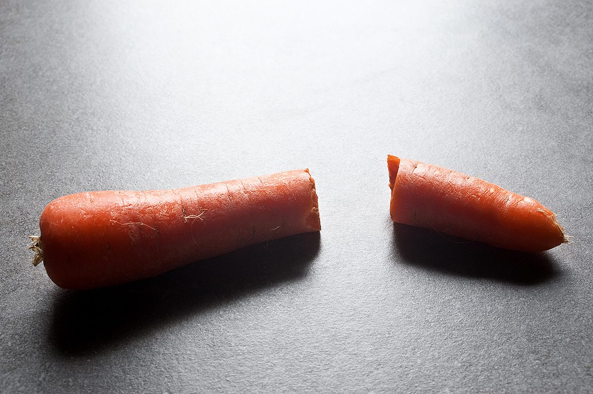 A carrot snapped in half