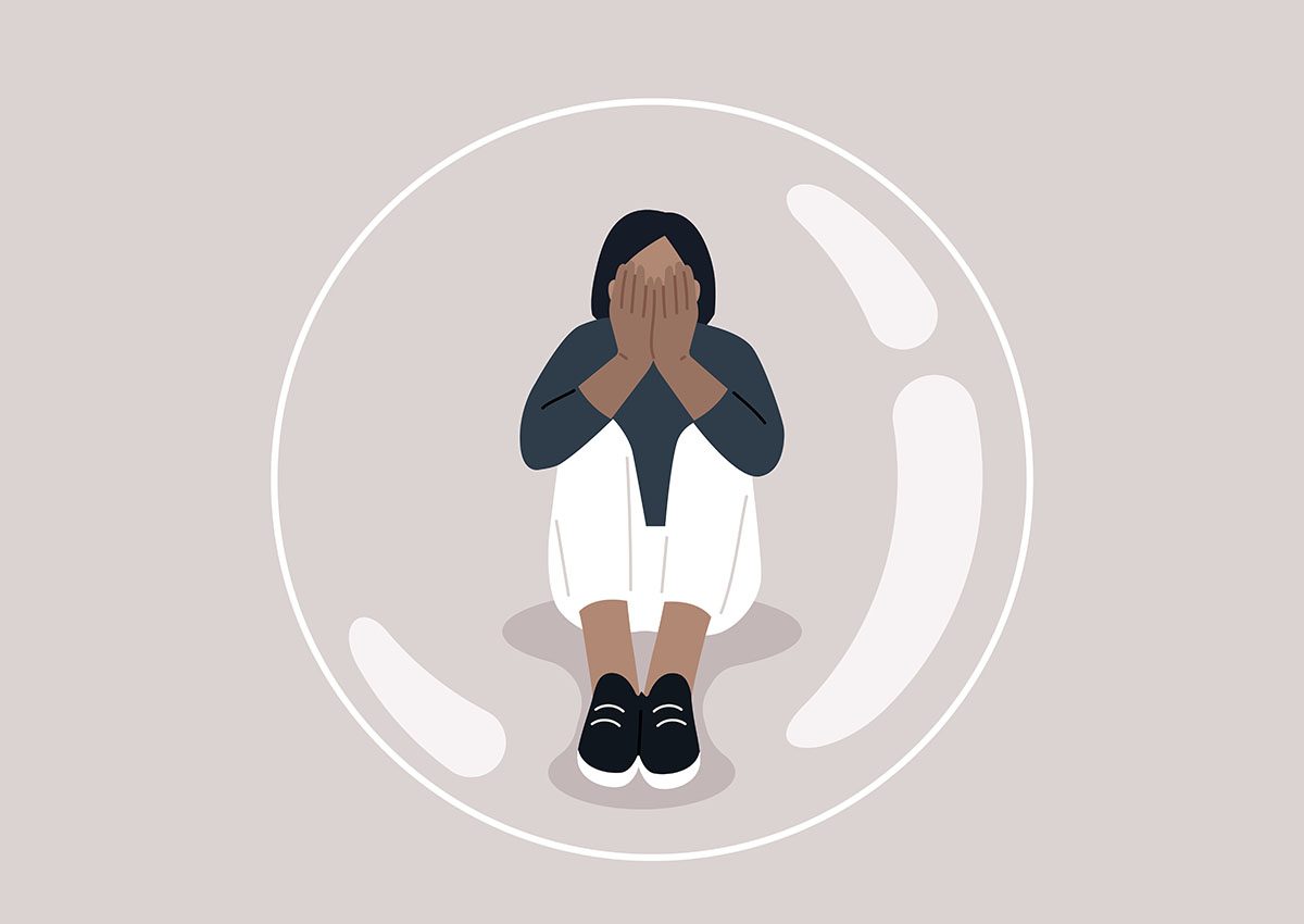 An illustration of a woman sitting with her head in her hands inside a bubble