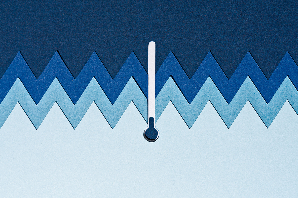 Thermometer is set against a blue zig-zag background.