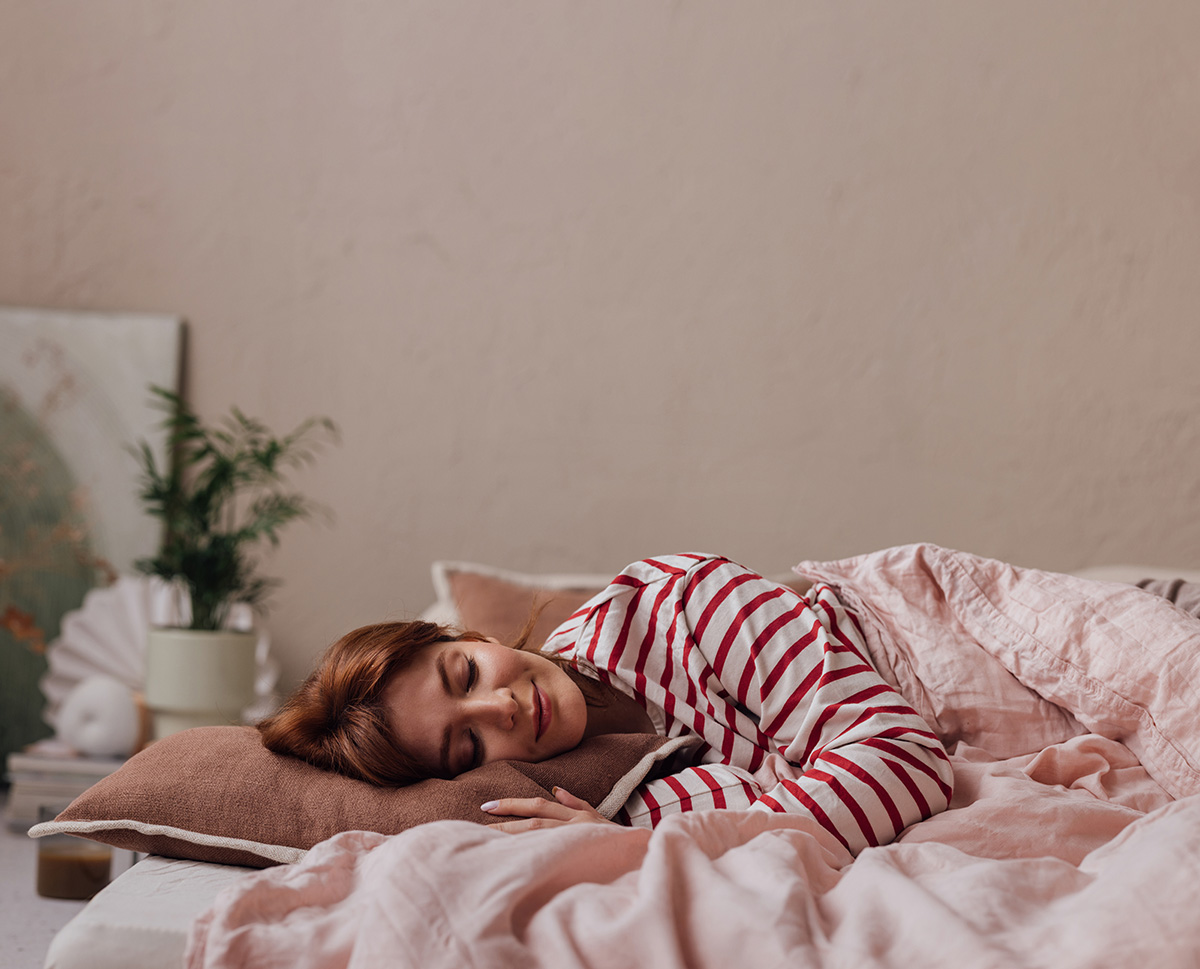 A woman relaxing in bed