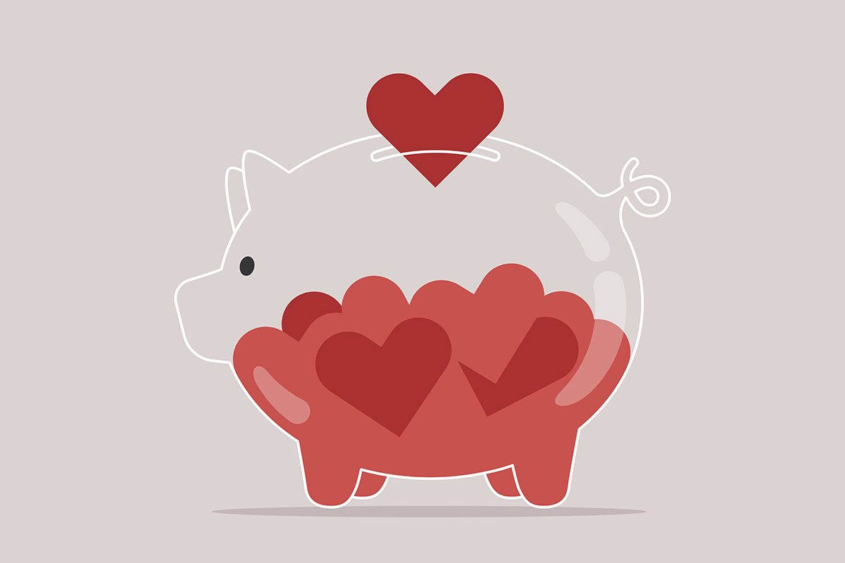An illustration of a piggy bank half filled with red hearts