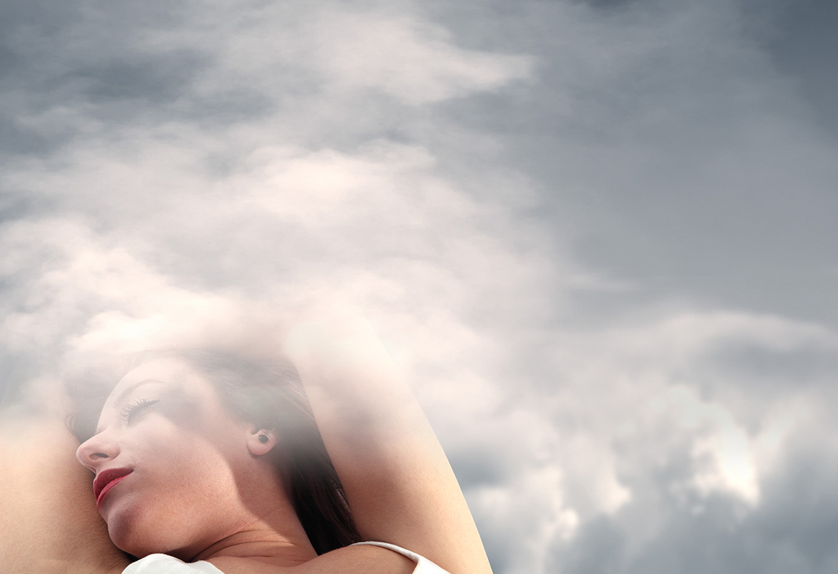 A woman surrounded by clouds