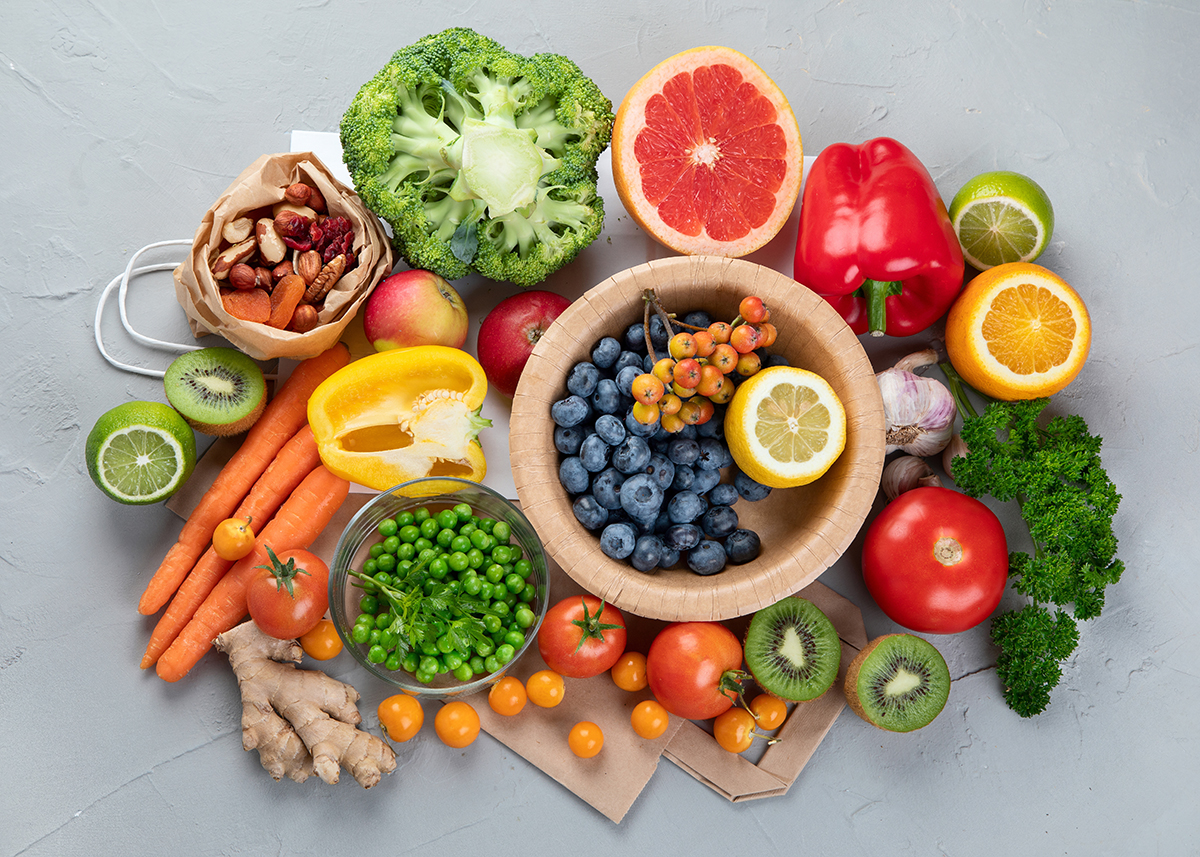 A variety of foods high in vitamin C, including fruits, vegetables and nuts