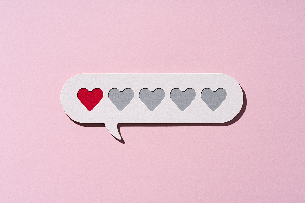 A speech bubble with one red heart to represent a low rating