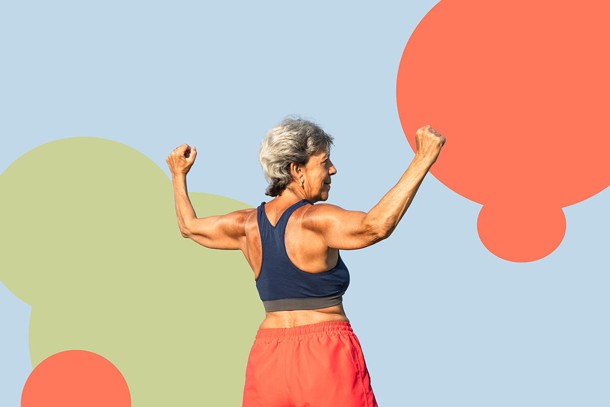 A senior woman standing with her back to the camera and flexing her biceps 