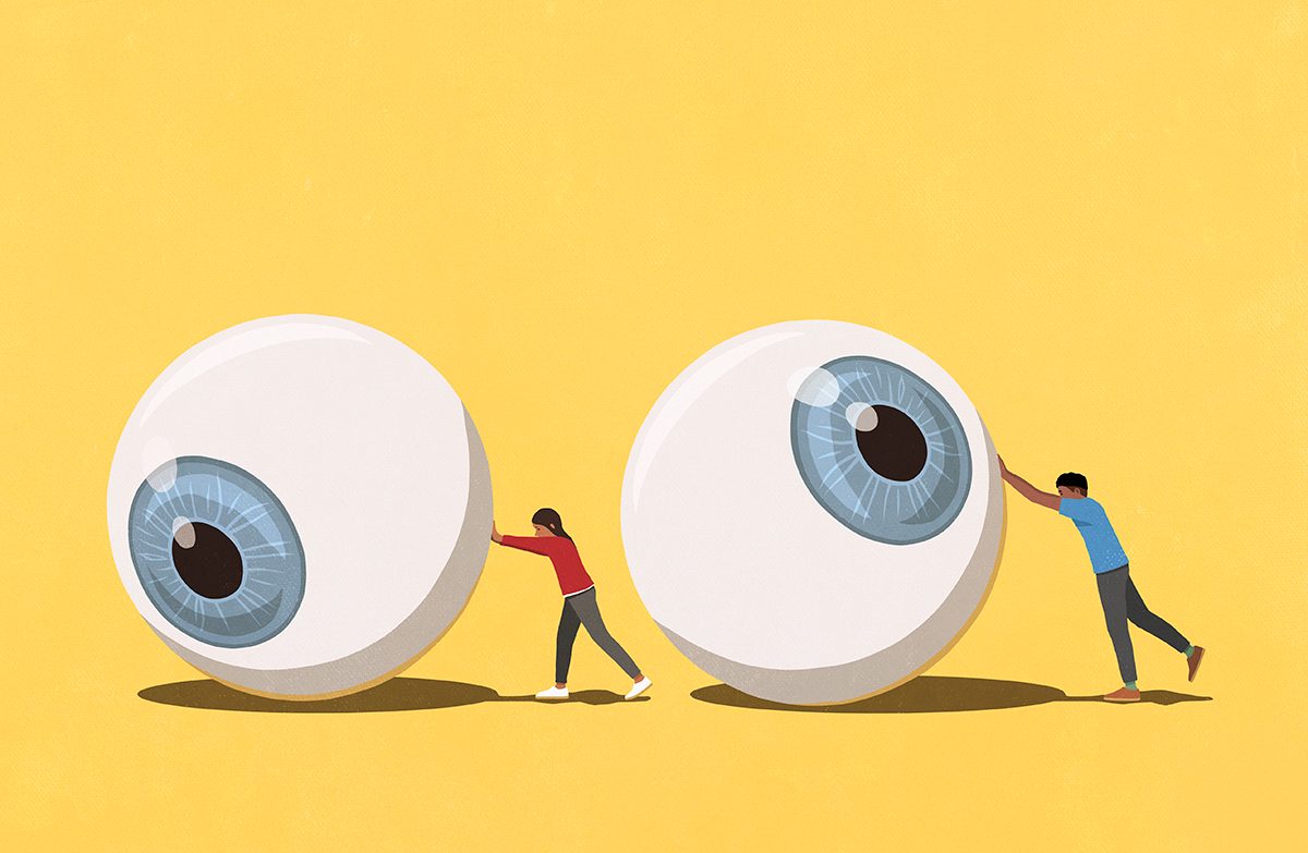 An illustration of a man and woman pushing large eyeballs against a yellow background