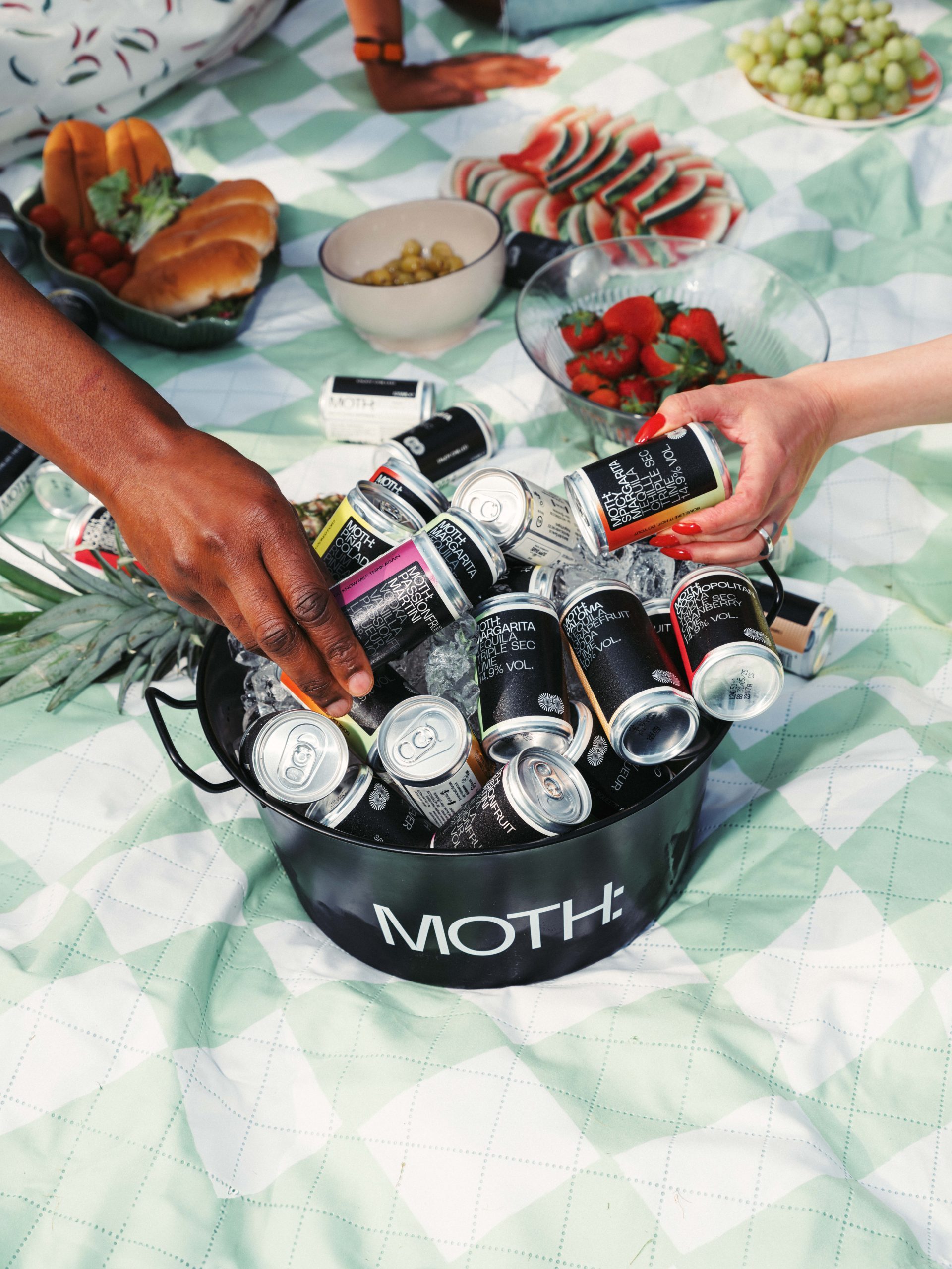 Ice bucket filled with cocktail cans