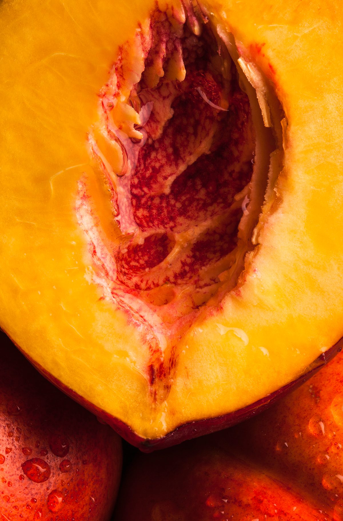 A close-up of a peach with the stone removed
