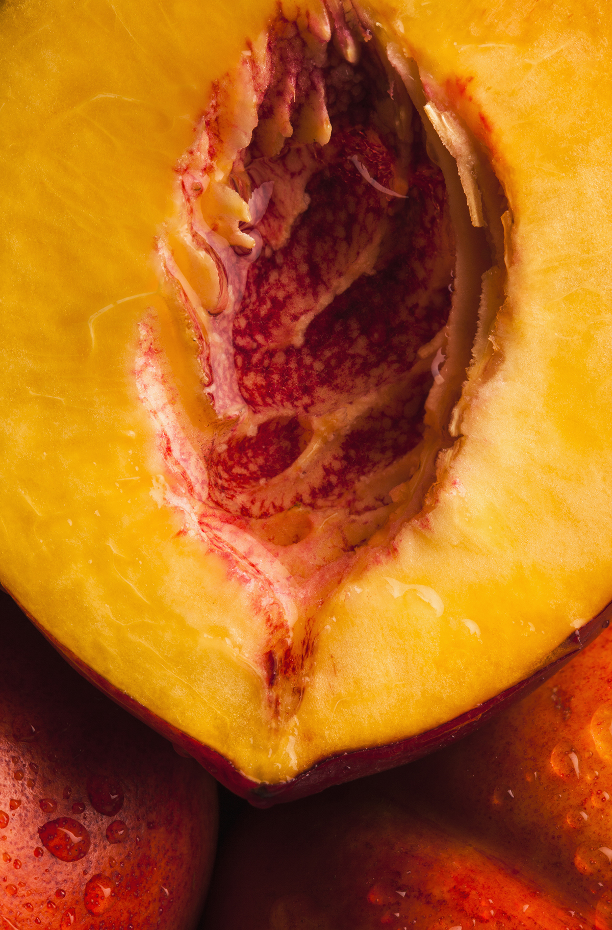 A close-up of a peach with the stone removed